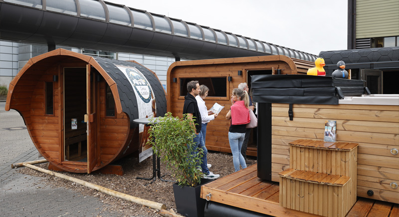 some tiny houses on display at caravan salon show in dusseldorf germany