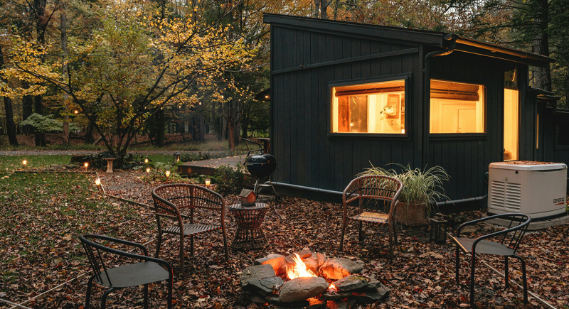 a holiday cabin in the woods in Autumn