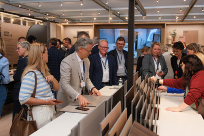 people looking at products at sicam show