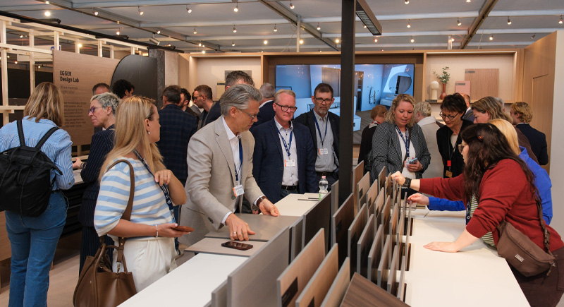 people looking at products at sicam show
